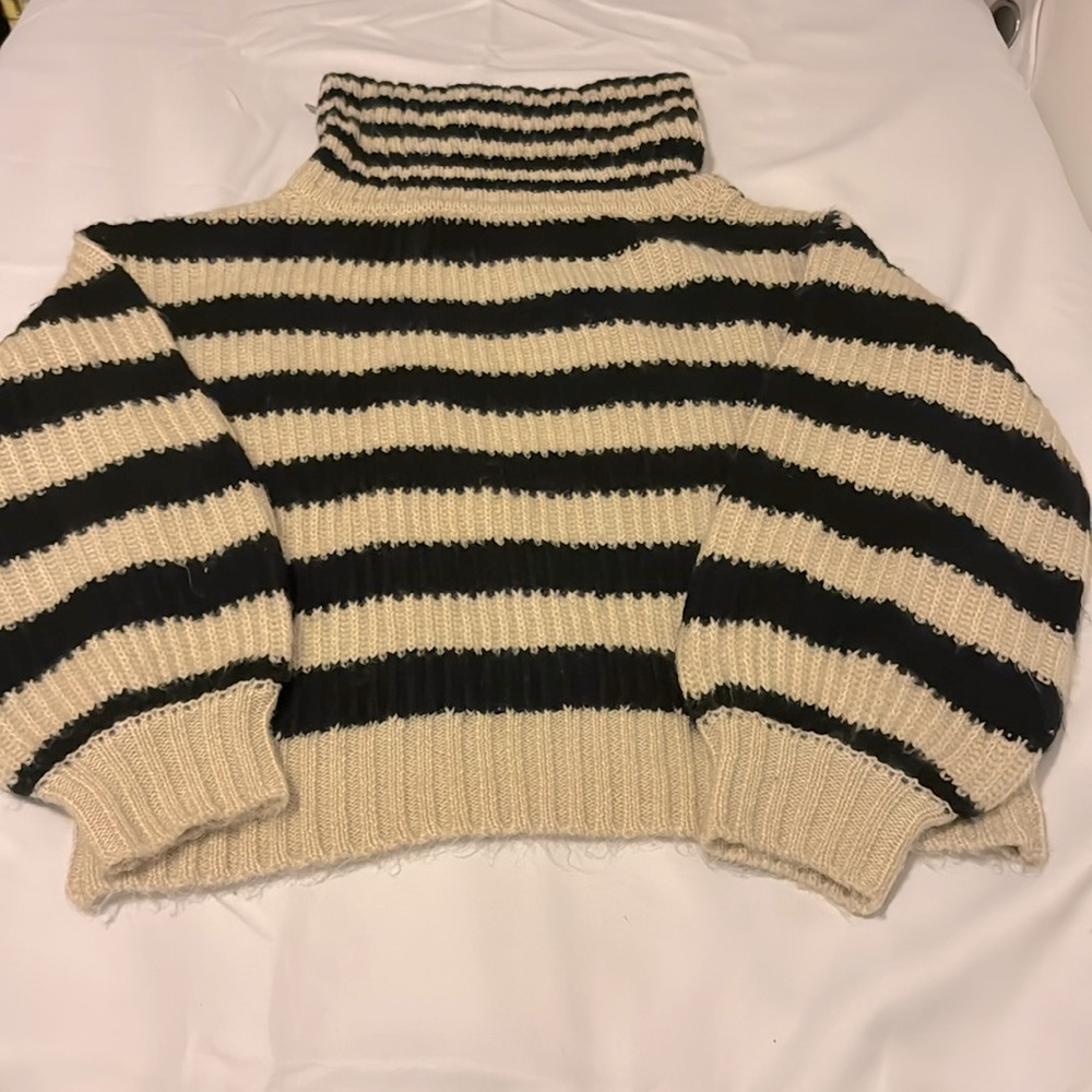 Design History | Knit Black And White Turtleneck Sweater